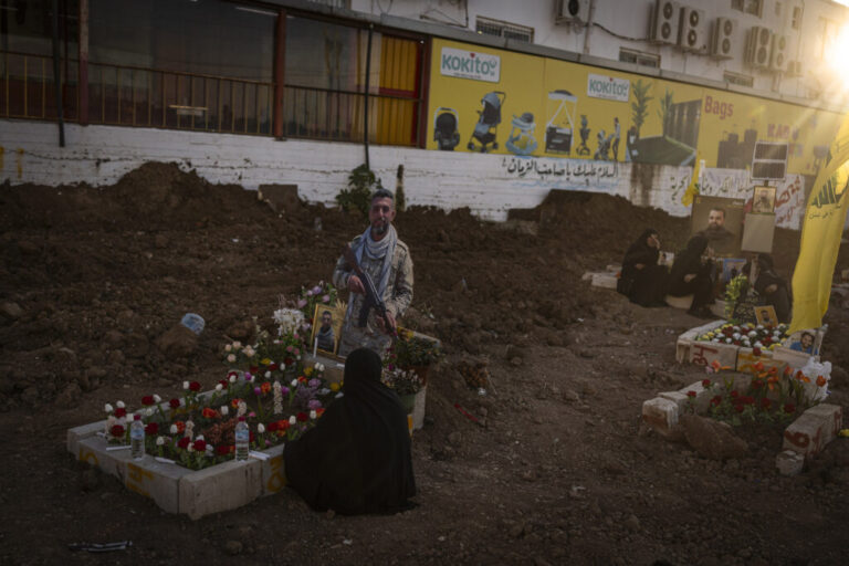 Hundreds of mourners marched on Thursday behind the coffins of three Lebanese Civil Defense paramedics killed by Israeli strikes in southern Lebanon. Their fellow paramedics, dressed in uniform, carried the coffins draped with Lebanese flags on their shoulders and saluted them, while mourners wept.