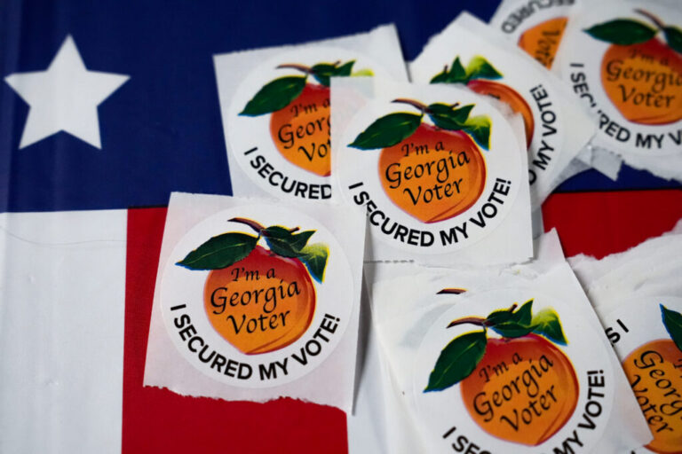 In this file photo, stickers featuring a peach with the words