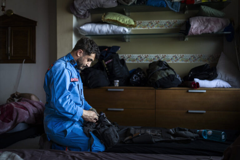 Nabatiyeh, Lebanon — May 13, 2026. Ali, a paramedic, gets ready before his shift begins in Nabatieh. Since the war erupted on March 2, 2026, 2,882 people have been killed. During the ceasefire, 380 people have been killed. Diego Ibarra Sánchez for NPR.