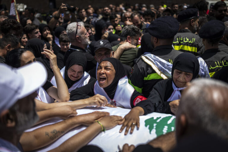 Saida, Lebanon. May 13, 2026. Mourners, relatives and collagees attend the funeral of Lebanese civil defense members Hussein Jaber and Ahmad Noura, who were killed in an Israeli strike on the southern town of Nabatieh on May 12, 2026. Diego Ibarra Sánchez for NPR