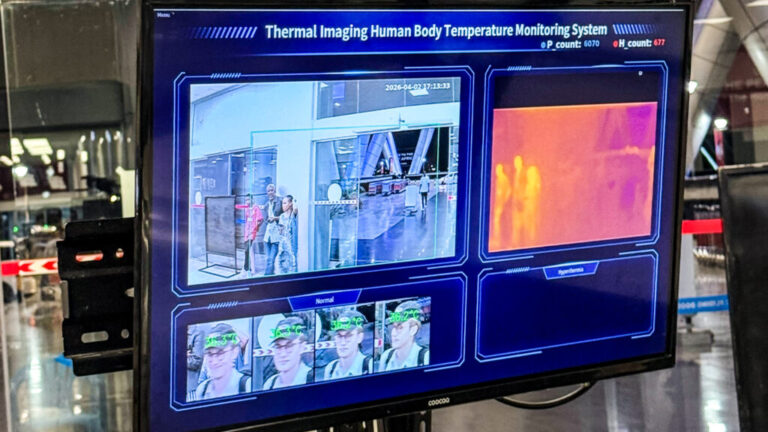 As travelers entered the Entebbe International Airport in Uganda on May 21, they were screened with a thermal camera that detects their temperature. Pictured at bottom is reporter Michal Ruprecht.