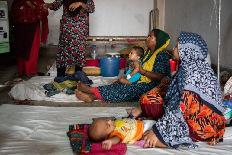 Rizvi Ahmed Raihan, a nine month old measles infected boy sits on his mothers lap while speaking with a pediatrician at Infectious Disease Hospital in Dhaka, Bangladesh, on 17 May, 2026.