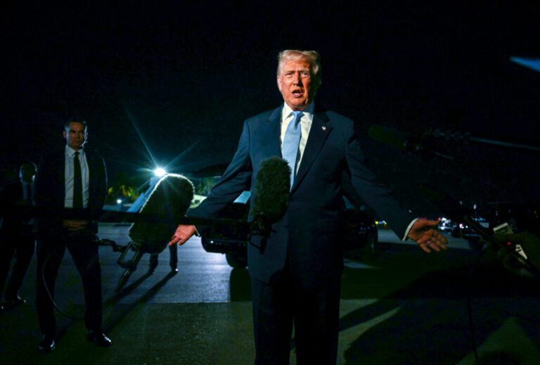 President Trump speaks with reporters before boarding Air Force One from Florida on Sunday.