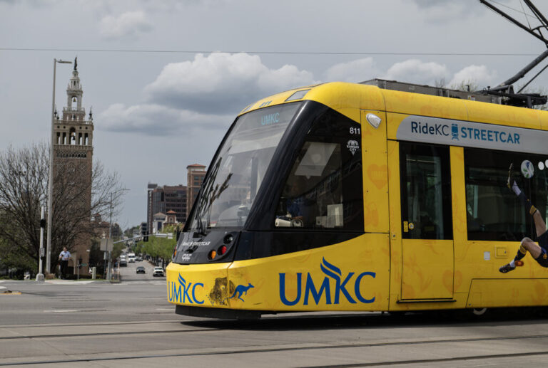 A streetcar passes by the Country Club Plaza in Kansas City, Missouri. As the smallest U.S. host city for the World Cup, Kansas City faces questions about how it will shuttle 650,000 expected visitors around town.