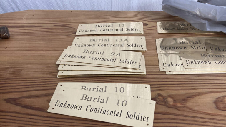 Plaques to help identify 14 unknown soldiers who were found at the site of the Battle of Camden and are being reburied are seen on Thursday, March 30, 2023, in Columbia, South Carolina. DNA analysis has recently identified one of them.