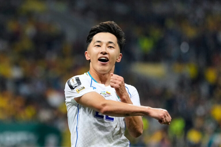 Uzbekistan's Abbosbek Fayzullaev celebrates after scoring his team's first goal during the World Cup Group K soccer match between Uzbekistan and Colombia in Mexico City, Wednesday, June 17, 2026.