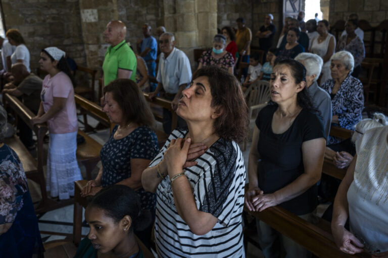 Tyre, Southern Lebanon — June 7, 2026. Christians attend Sunday Mass at St. Thomas Cathedral. Israeli airstrikes have targeted residential areas in Tyre, leaving entire neighborhoods empty. More than 3,500 people have been killed in Israeli attacks, and over one million have been displaced, deepening an already severe humanitarian crisis and further complicating ceasefire efforts. Diego Ibarra Sánchez for NPR.