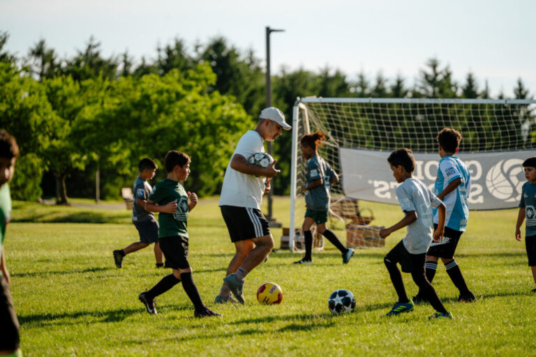 Dearborn, MI - June 11, 2026: Director of Michigan FC, Abbas Alwishah, 44, coaching during a Michigan FC practice in Dearborn, MI. (Photo by Nick Hagen for NPR)