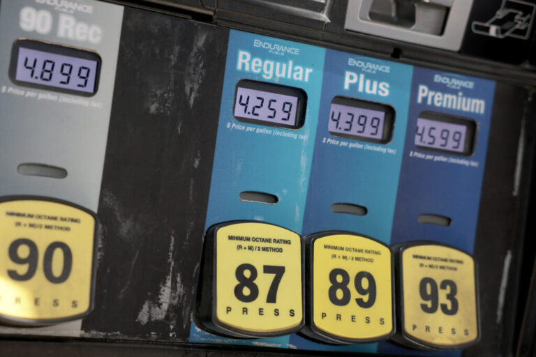 A gas pump displays prices above $4 a gallon.