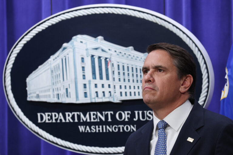Acting U.S. Attorney General Todd Blanche listens to a reporter's question during a press conference at the Department of Justice on June 11 in Washington, D.C. The DOJ is offering public safety grants to cities and police departments across the country.