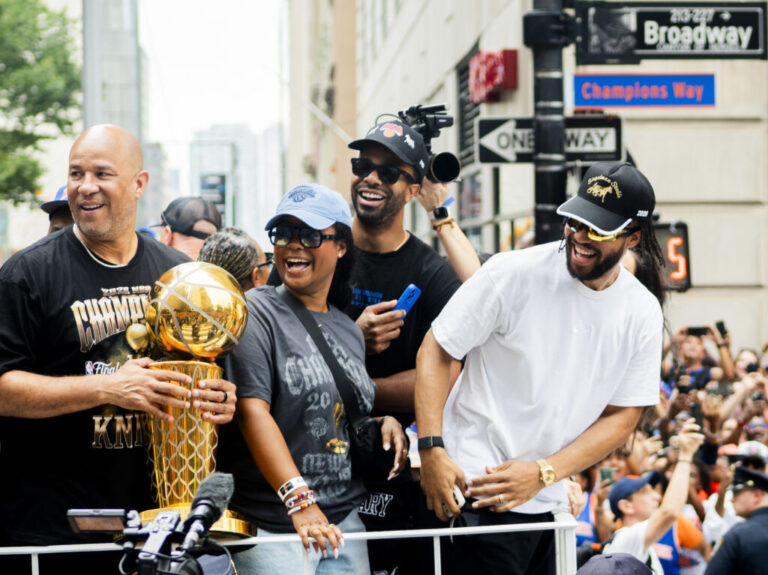Jalen Brunson and Rick Brunson of The New York Knicks celebrate winning the 2026 NBA Championship with a ticker tape parade at City Hall.
