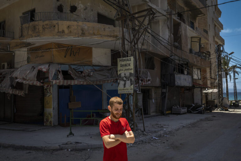 Tyre, Southern Lebanon — June 7, 2026. A resident walks through the nearly empty, ghost-like streets of Tyre during an evacuation warning. More than 3,500 people have been killed in Israeli attacks, and over one million have been displaced, deepening an already severe humanitarian crisis and further complicating ceasefire efforts. Diego Ibarra Sánchez for NPR.