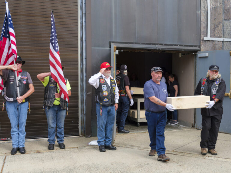 Members of the Patriot Guard Rider's motorcycle club transfer the remains of Revolutionary War soldiers from the New York State Museum in Albany to their resting place at a new memorial site called “Repose of the Fallen” in Lake George Battlefield Park.