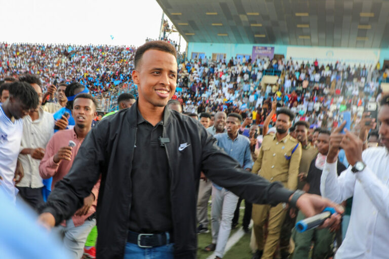 Somali referee Omar Artan greets fans who show support for him, after he was denied entry into the United States where he had traveled to take part in the World Cup and was forced to return to his country, in Mogadishu, Somalia on June 10, 2026.