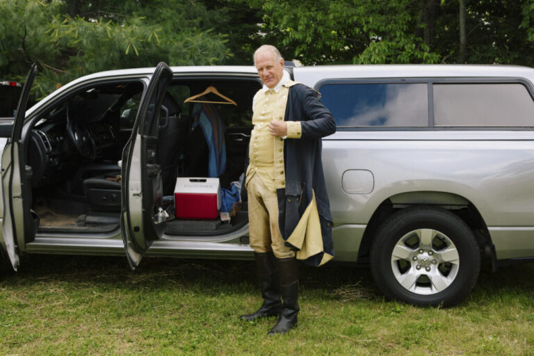 Reenactor John Koopman III gets dressed as George Washington before the event Living History: George Washington’s Encampment at the Thomas Baird Homestead in Millstone Township, New Jersey.