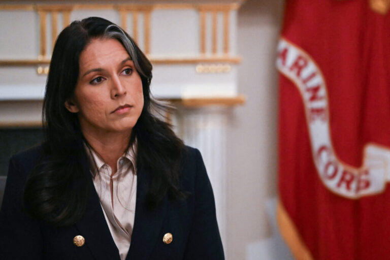 Director of National Intelligence Tulsi Gabbard listens as President Trump speaks during a Cabinet meeting at the White House on Dec. 2, 2025.