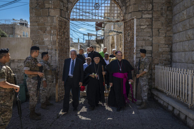Tyre, Southern Lebanon — June 7, 2026. Religious leaders on their way to Sunday Mass at St. Thomas Cathedral. Israeli airstrikes have targeted residential areas in Tyre, leaving entire neighborhoods empty. More than 3,500 people have been killed in Israeli attacks, and over one million have been displaced, deepening an already severe humanitarian crisis and further complicating ceasefire efforts. Diego Ibarra Sánchez for NPR.