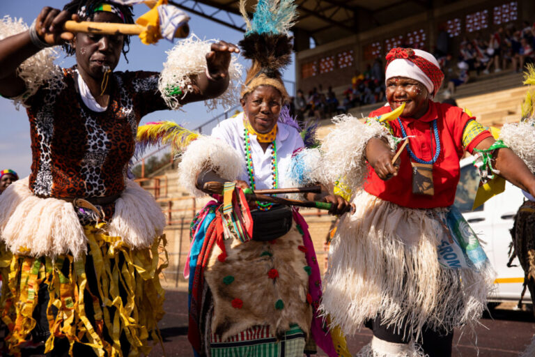 Dancers in traditional dress accompanied the South Africa's Mbombela team at the opening ceremony of the grannies tournament, which involved a 15-minute walk from Mama Beka’s home in Nkowankowa to the stadium.