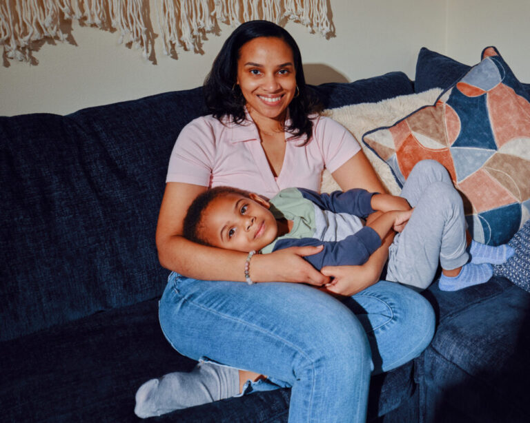 Monique Morris, with her son Brandon at their home in Milwaukee, Wis., faced a Stage 2 breast cancer diagnosis at 31.