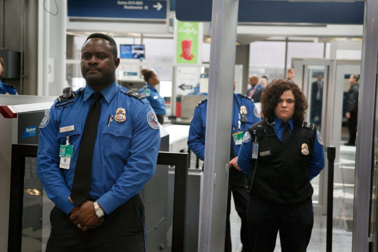 Transportation Security Administration officers staff a checkpoint at O'Hare International Airport in Chicago, Ill., in this 2010 photo. The agency was created after the Sept. 11, 2001, attacks — but not every U.S. airport uses federal screeners.