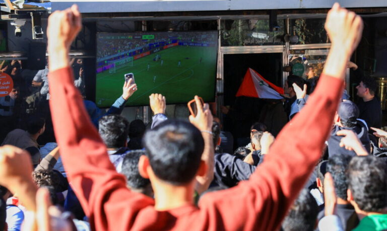 Iraqis gather on the streets to watch Iraq play against Bolivia during the FIFA World Cup inter-confederation playoff, in Baghdad, Iraq, April 1, 2026.