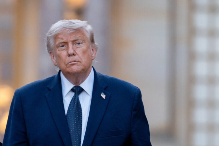 President Trump arrives for a gala dinner at the Versailles Palace in Versailles, France, on Wednesday, where the White House later said he signed the memorandum of understanding with Iran.