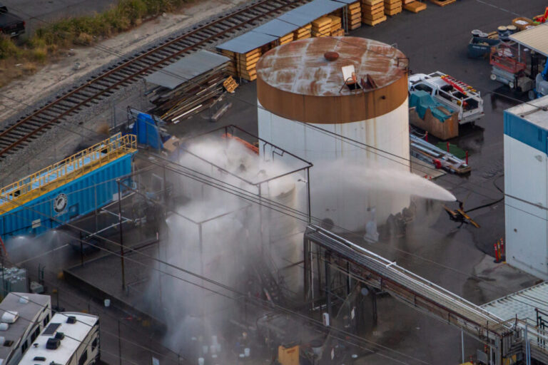 An aerial view of water being sprayed onto an overheated 34,000-gallon tank at GKN Aerospace on May 23, 2026 in Garden Grove, California. A malfunctioning tank at an aerospace plant has the potential of a chemical leak or explosion.