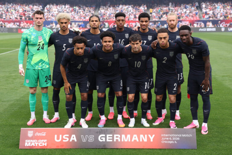 Players of the United States pose for a team photograph prior to their World Cup tune-up match against Germany at Chicago's Soldier Field on Saturday.
