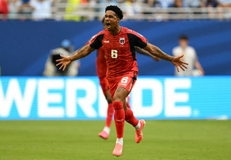 Cape Verde's midfielder Kevin Pina celebrates after scoring his team's first goal during a World Cup match against Uruguay in Miami Gardens, Fla., on Sunday. Cape Verde played Uruguay to a 2-2 draw.