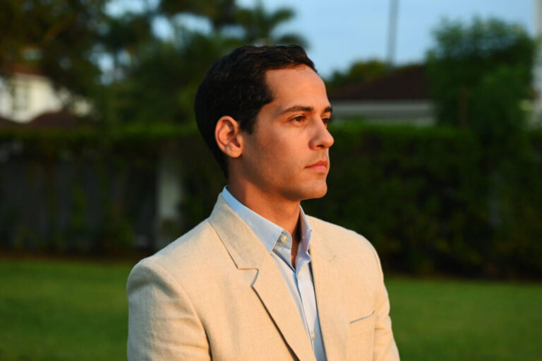 Martin Langesfeld, the brother of Nicky Langesfeld, poses for a photo near the street named in his sister's memory in Doral, Florida, on April 27, 2026. Martin's sister Nicky and her husband, Luis Sadovnic, died in the 2021 Surfside condominium collapse in Miami.