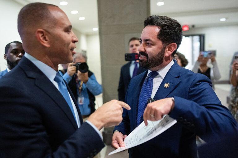 Representative Mike Lawler (right), R-N.Y., confronts House Minority Leader Hakeem Jeffries, D-N.Y., about signing on to a bill that would extend Affordable Care Act tax credits, on October 8.