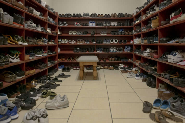 People leave their footwear outside the main hall at the gurdwara( a place of worship). They wash their hands and tie a head covering before entering the main hall of worship.