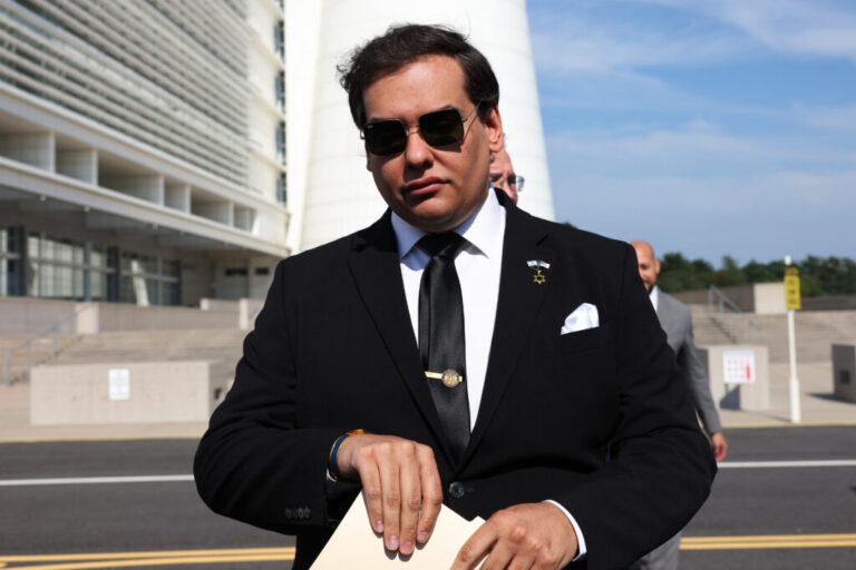 Former U.S. Rep. George Santos is being investigated by federal regulators over his trading activity on the prediction market site Kalshi.