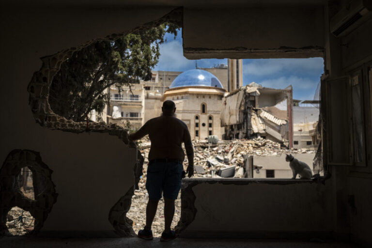 Tyre, Southern Lebanon — June 7, 2026. A resident observes the destruction from his destroyed home. More than 3,500 people have been killed in Israeli attacks, and over one million have been displaced, deepening an already severe humanitarian crisis and further complicating ceasefire efforts. Diego Ibarra Sánchez for NPR.
