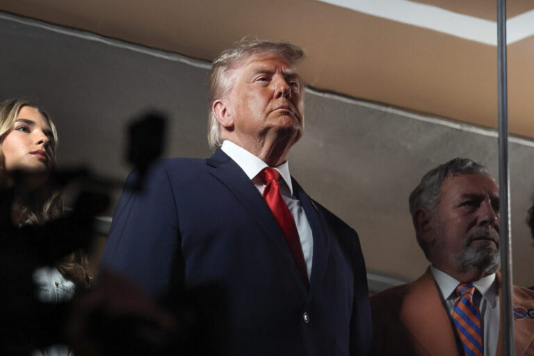 President Trump watches the start of Game 3 of the NBA Finals between the New York Knicks and San Antonio Spurs at Madison Square Garden on June 8. Trump says the U.S. has reached a deal with Iran.