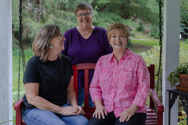 June Ward (right) — pictured with her sisters Susie Gilliam (center) and Karen Douthitt (left) — carries a rare gene mutation that virtually guarantees she will get Alzheimer’s in the next few years. She is part of a network of more than 200 families with these kinds of gene mutations who have volunteered as research subjects over the past two decades.