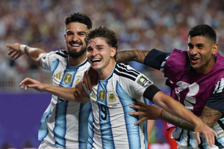 Argentina forward Julián Alvarez (C) celebrates scoring his team's second goal during the World Cup quarterfinal match against Switzerland in Kansas City on Saturday. Argentina has advanced to the semifinals and will play England on Wednesday.