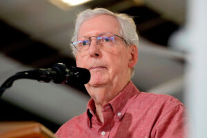 McConnell says a fall led to his hospitalization, breaking weeks of silence