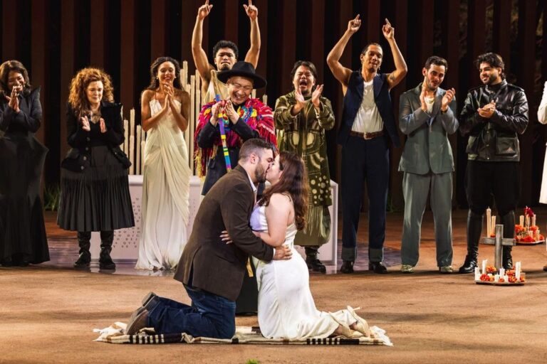 Oscar Diaz and Janelly Mendoza (kneeling), from Laredo, TX, were married on stage after a performance of Romeo and Juliet at the Public Theater's Delacorte Theater.