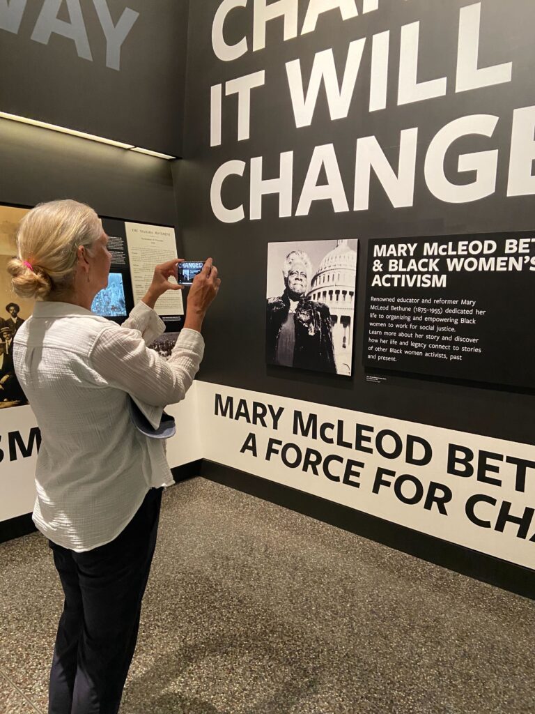 Shelley Smith, a retired public health professional, is one of hundreds of volunteers documenting wall text, objects and images at the Smithsonian as part of an effort to document what's there now before any changes are made as a result of the Trump Administration's continued pressure on the institution.