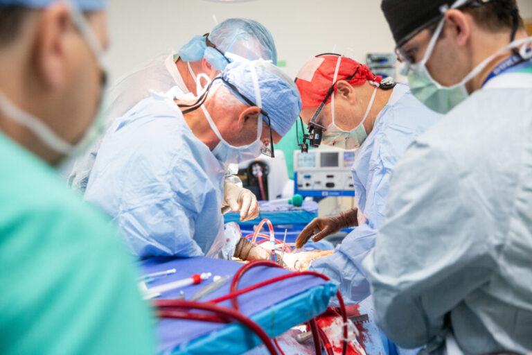 Dr. Marty Sellers (wearing a red scrub cap) and his team from Tennessee Donor Services perform a normothermic regional perfusion organ recovery at a hospital in eastern Tennessee.