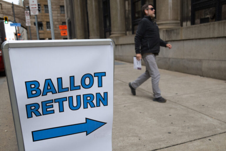 Voters drop off their mail-in ballots in Pittsburgh, Pa., on Nov. 4, 2024.
