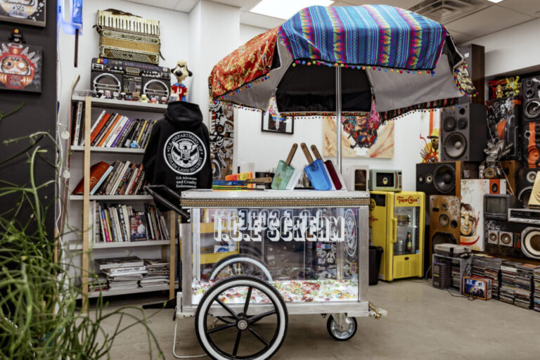 An installation styled as a paleta cart is part of Victor