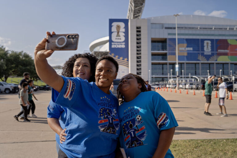 Cabo Verde fans take pictures before the match between Cabo Verde and Saudi Arabia during FIFA World Cup at the Houston Stadium in Houston, Texas, on June 26, 2026.
