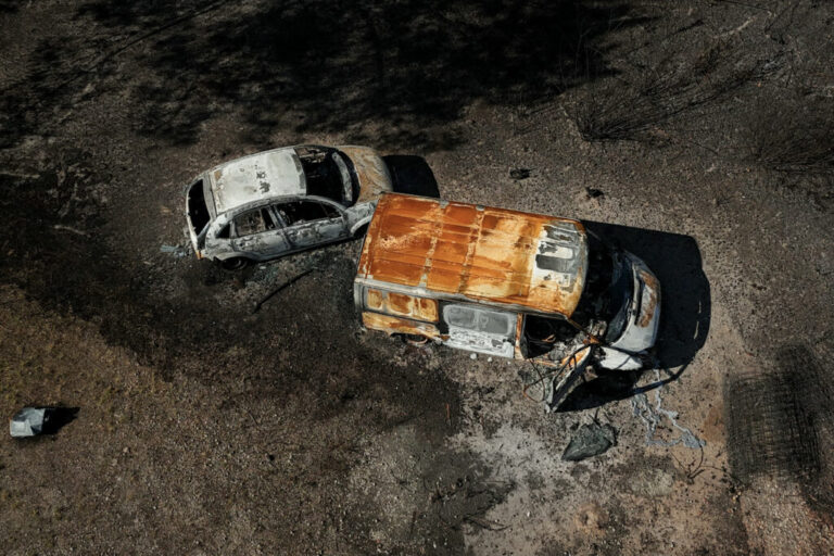 This aerial photograph shows burnt premises and vehicles destroyed by a wildfire in a business park in Biscarrosse, southwestern France, on July 28, 2026.