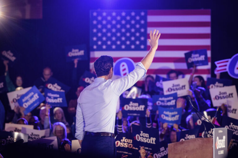Sen. Jon Ossoff, D-Ga., waves to attendees during a reelection campaign event in Atlanta on Feb. 7.