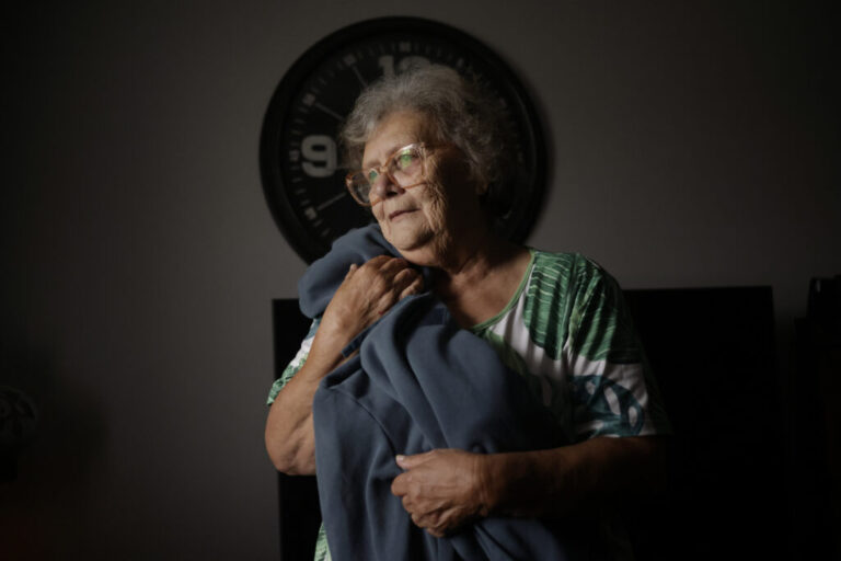 Cindy Leachman Aldridge embraces a hooded sweatshirt that belonged to her late grandson, Jonah Neal, at her homein Owensboro, Ky.
