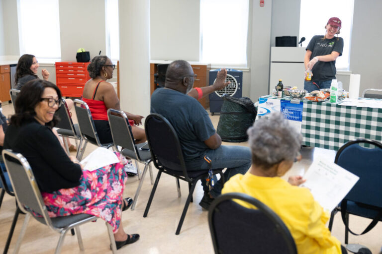 Jules Koehl, community nutrition coordinator for The Food Trust, gives a healthy cooking demonstration to community members at Spectrum Health in Philadelphia, Penn. on July 15, 2026.