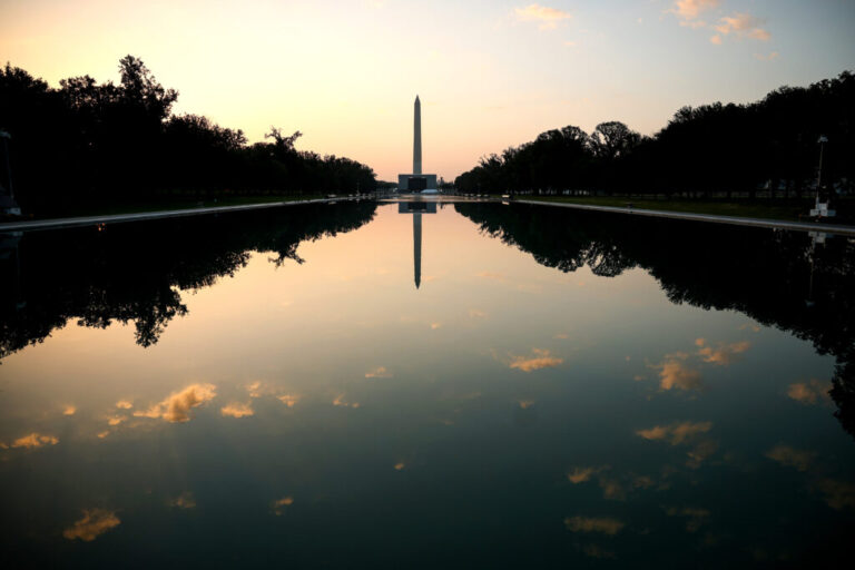 The sun begins to rise over the Lincoln Memorial Reflecting Pool on July 02, 2026 in Washington, DC. Temperatures in the nation's capital are expected to top 100 degrees as a heat wave stretching from the Midwest to the East Coast impacts up to 90 million Americans.