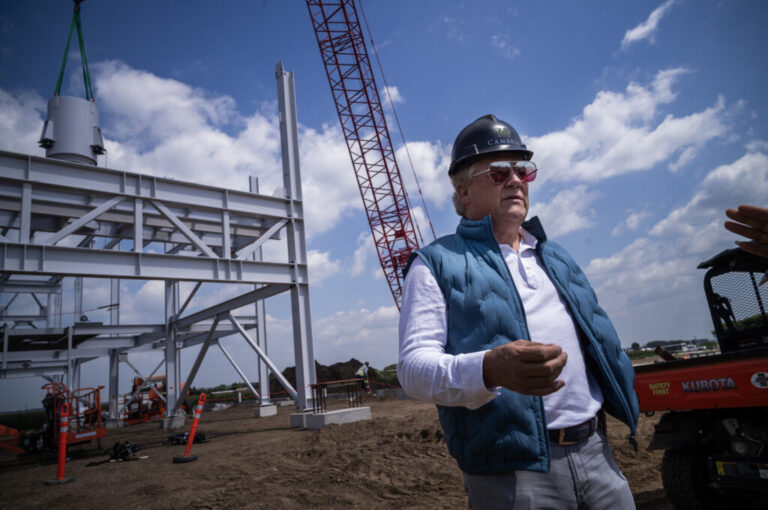 CEO of Cambria Marty Davis speaks on the job site of the countertop company's new $80 million quartz processing plant and rail center in Randolph, Minn., on Aug. 13, 2025.